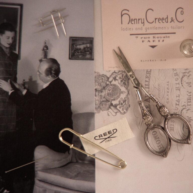 House archive: a Henry Creed and Co tailors card from Paris with a fitting in progress, Creed