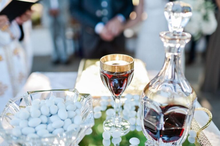 A church altar table with a wine goblet, decanter and sugared almonds, Crete for Love