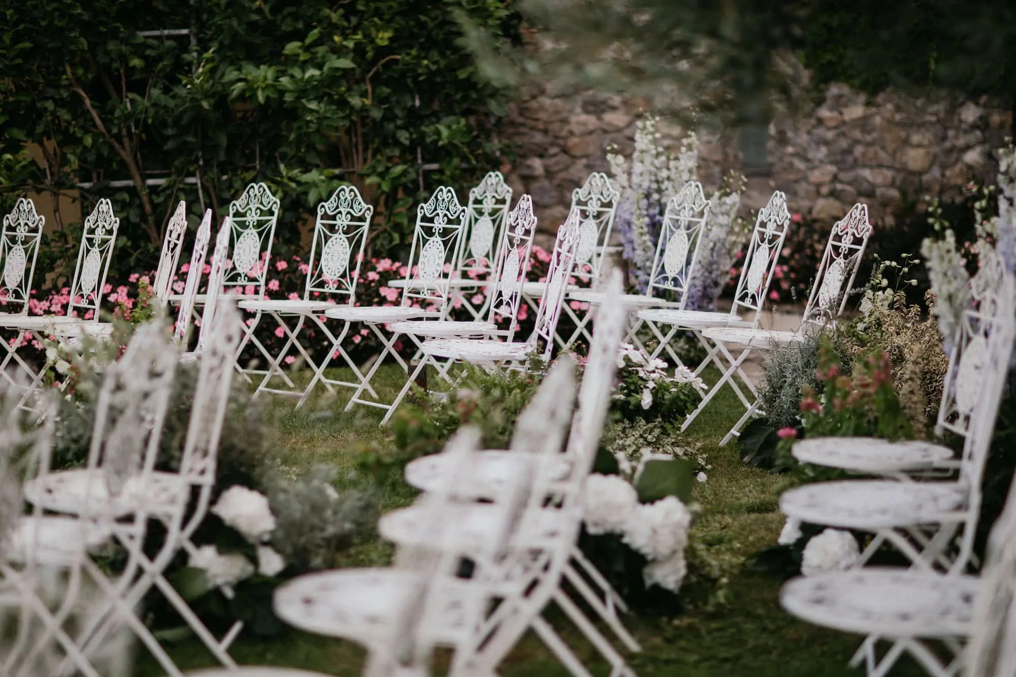 White metal chairs arranged in a terraced garden for an outdoor ceremony, Ravello, Cristina Verger Event Planning and Production