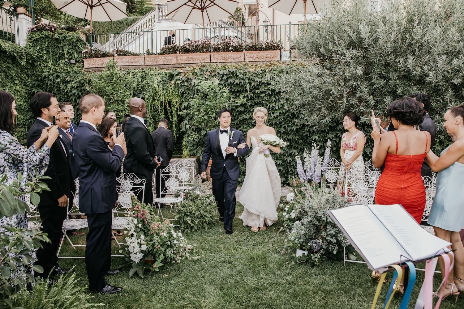 The groom and guests along the garden aisle during a ceremony above the Amalfi coast, Ravello, Cristina Verger Event Planning and Production