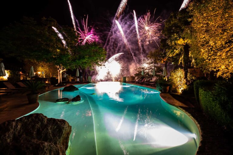Fireworks over a floodlit swimming pool at a Tuscan villa, Cristina Verger Event Planning and Production