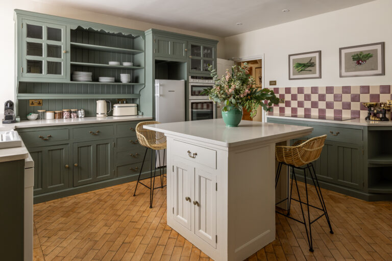 The Farmhouse kitchen, with a painted dresser and central island, for self-catered suppers, Crockwell Farm