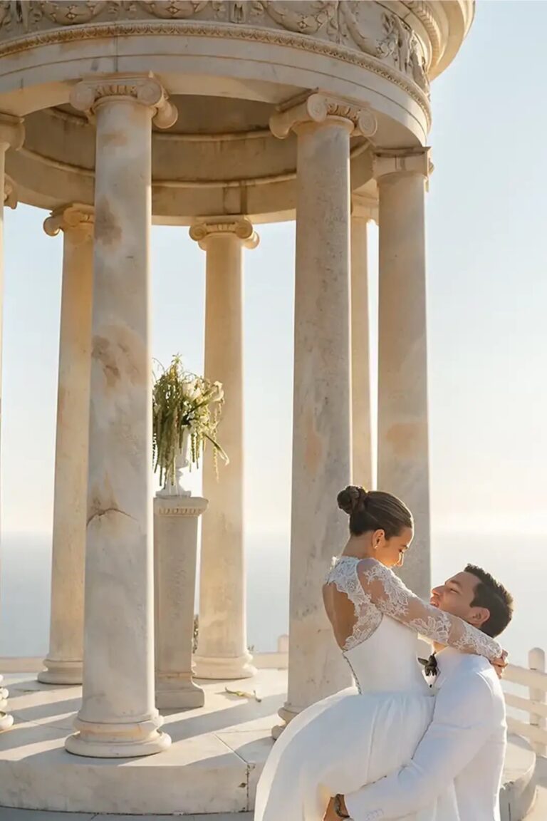 A couple embracing inside the marble pavilion at sunset, Cygnus Events