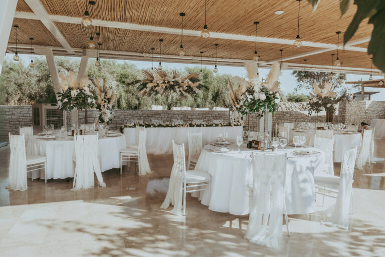 Reception hall dressed with pampas grass and white florals, Cyprus Wedding Touches