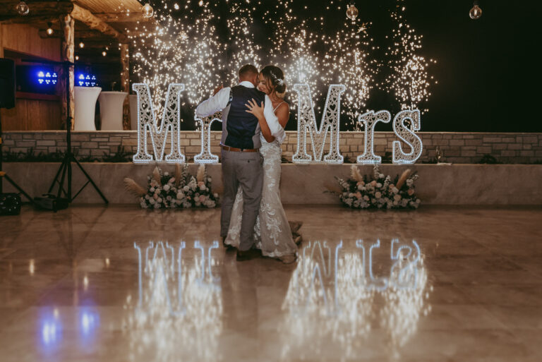 First dance beneath a Mr and Mrs sign with sparklers, Cyprus Wedding Touches