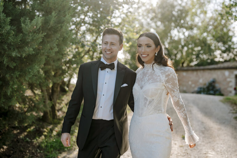 A couple laughing together on a country lane at The Lazy Olive, Tuscany, Daniele Vertelli Photography