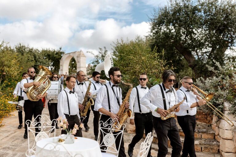 A brass band playing through the guests at Masseria Grieco, Puglia, Daniele Vertelli Photography