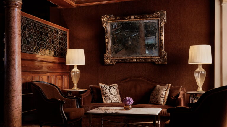 Wood panelled lounge with lamps and mirror, Danieli, Venezia, A Four Seasons Hotel