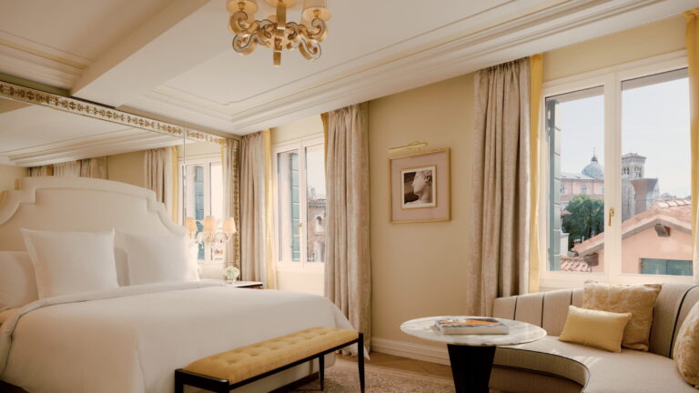 Guest room with arched headboard and lagoon outlook, Danieli, Venezia, A Four Seasons Hotel