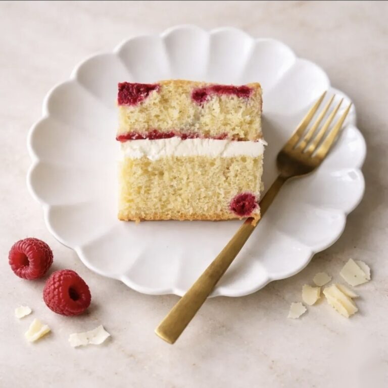 A slice of sponge layered with berries and white chocolate, Danielle's Cakes Pershore