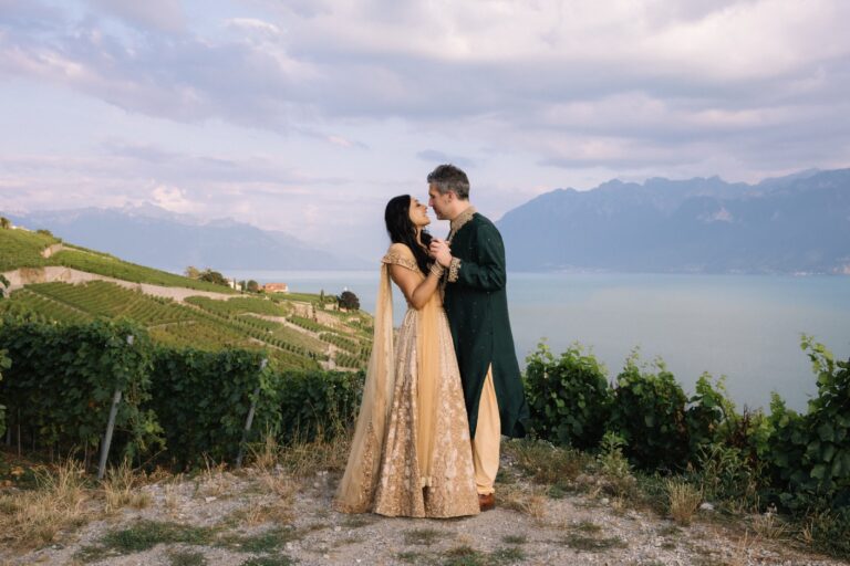 Couple in traditional dress on vineyard terraces above the lake, Daria Events and Weddings