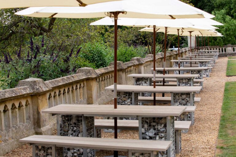 Parasols and benches along the balustraded terrace, De Vere Horsley Estate