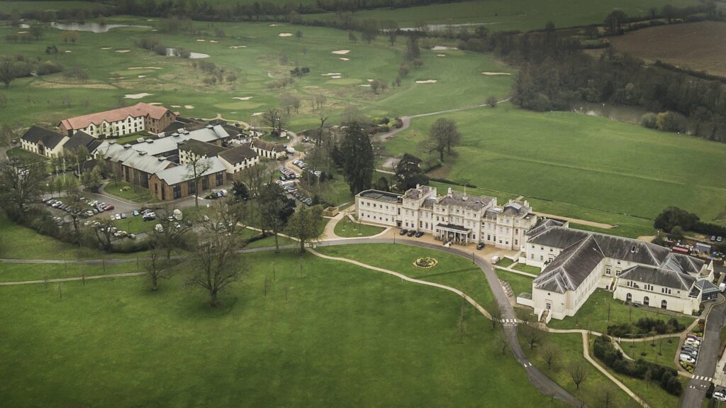 Aerial view of the estate, mansion and parkland, De Vere Wokefield Estate