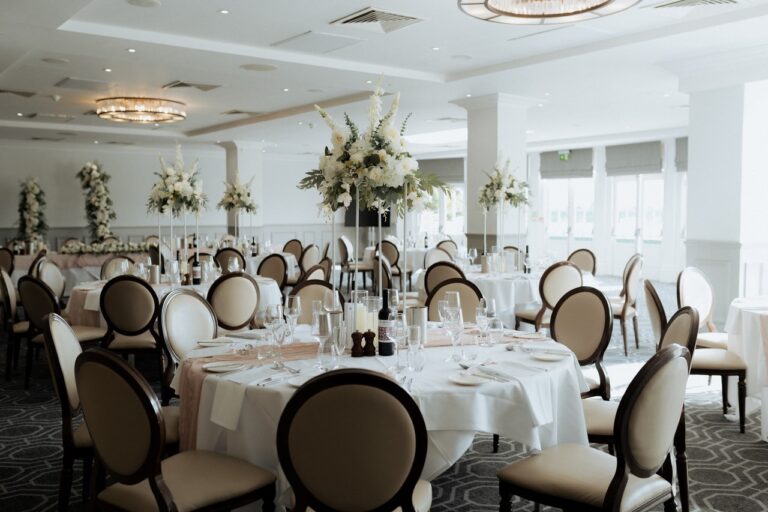 A round table laid with flowers, De Vere Wokefield Estate