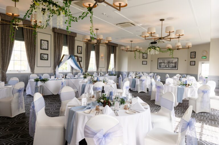 A reception suite with white chair covers, De Vere Wokefield Estate