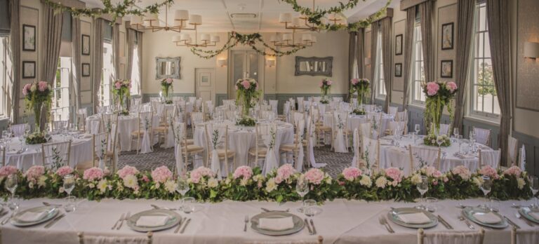 A long table with a flower runner, De Vere Wokefield Estate