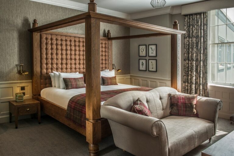 A four-poster bedroom in the mansion, De Vere Wokefield Estate