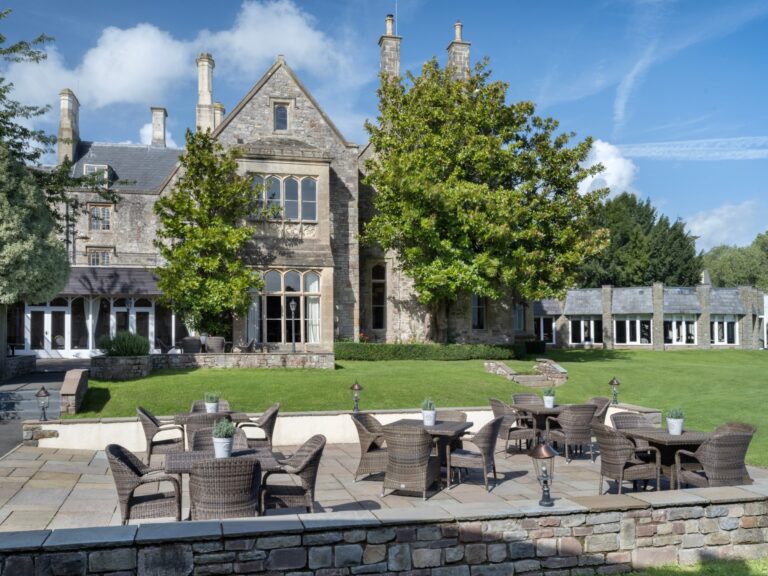 The manor house and a terrace with tables, Delta Hotels St. Pierre Country Club