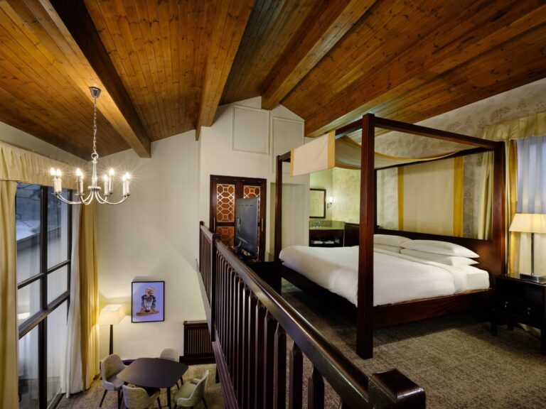 A lakeside honeymoon suite bedroom, Delta Hotels St. Pierre Country Club