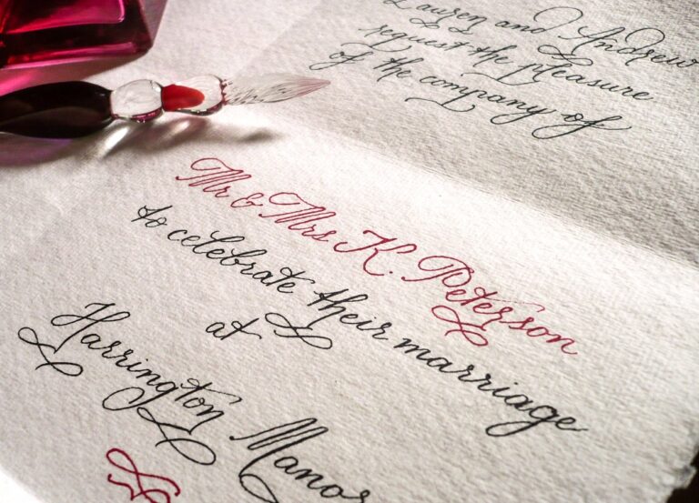 Wedding invitation written by hand in black and red ink on deckle edged paper, Denise Hagon Calligrapher