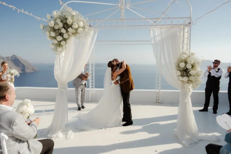 A ceremony beneath a draped structure above the sea at the Diamond Rock Venue, Santorini, Diamond Rock Santorini