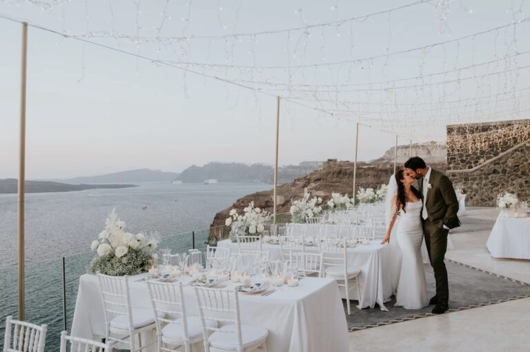 A dinner terrace dressed in white above the caldera at Cavo Ventus, Santorini, Diamond Rock Santorini