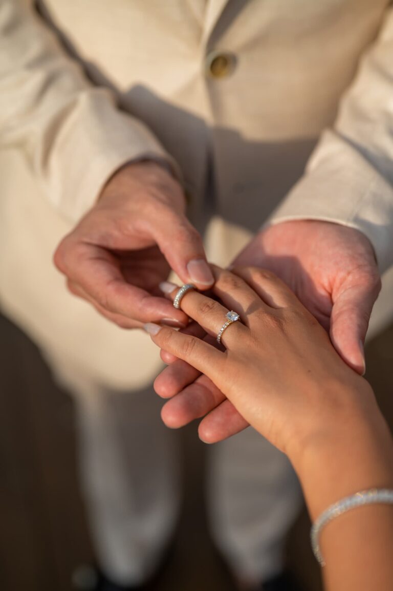 A wedding ring slipped onto the bride's finger, Dimas Frolov Photography