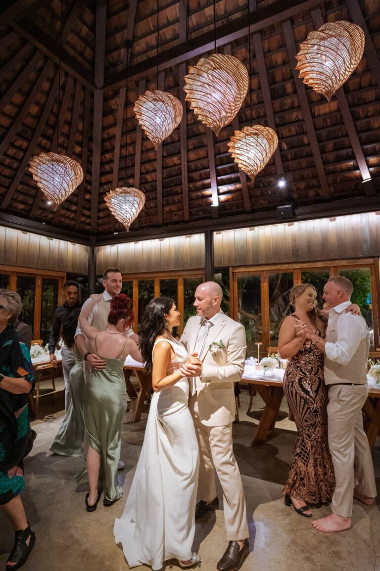 A first dance beneath a canopy of woven lamps, Dimas Frolov Photography
