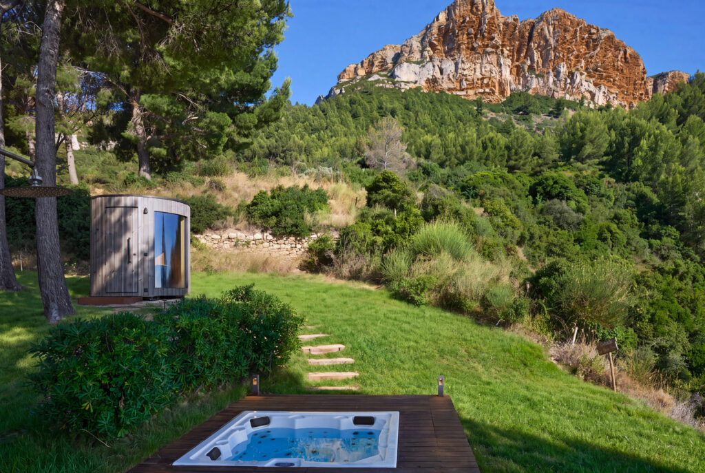 The garden hot tub below the cliffs, Domaine de Canaille