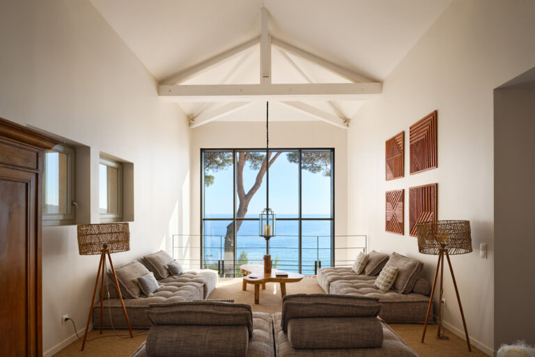 A lounge looking out through the pines, Domaine de Canaille