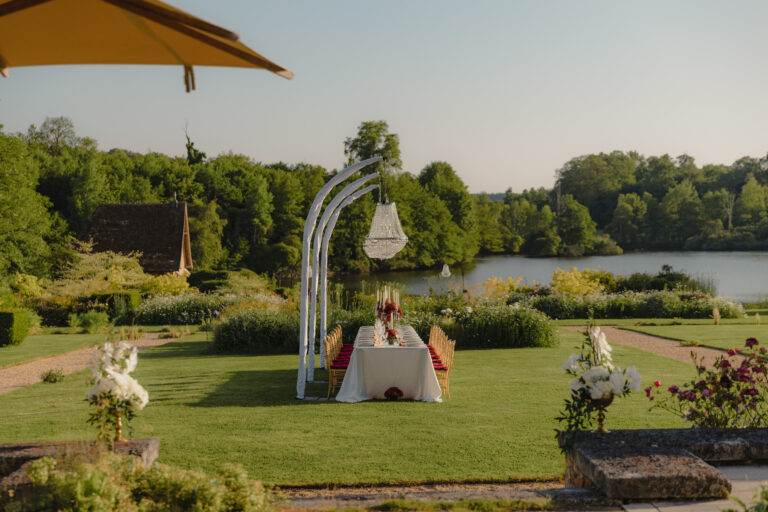 Place de la Chapelle, the lakefront lawn set for a ceremony, Domaine des Etangs, Auberge Collection