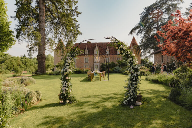 Floral arches in the Longère Gardens, Domaine des Etangs, Auberge Collection