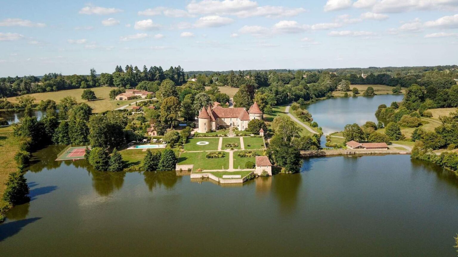 An aerial view of the château, gardens and lakes