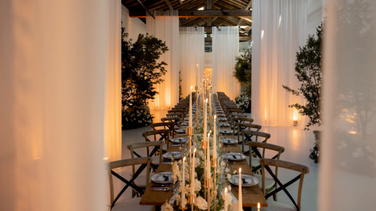 Long table and candles in La Laiterie, Domaine des Etangs, Auberge Collection