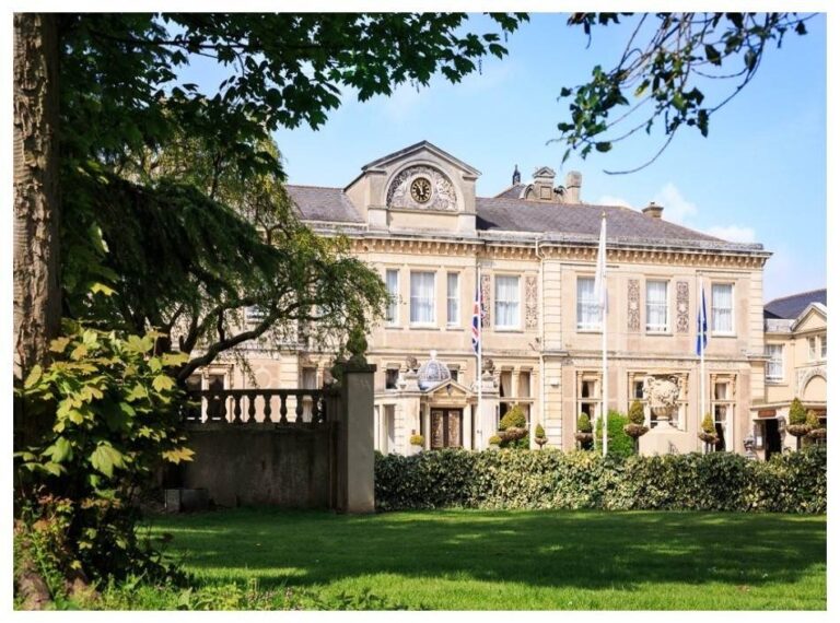 The mansion seen across the lawn, Down Hall Country House Hotel
