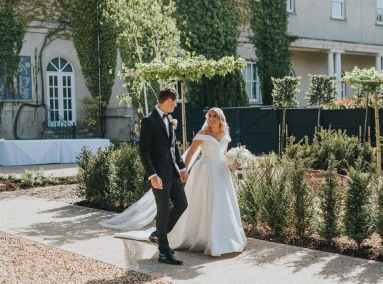 A couple walking in the gardens, Down Hall Country House Hotel