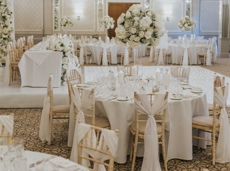 Tables dressed with floral centrepieces, Down Hall Country House Hotel