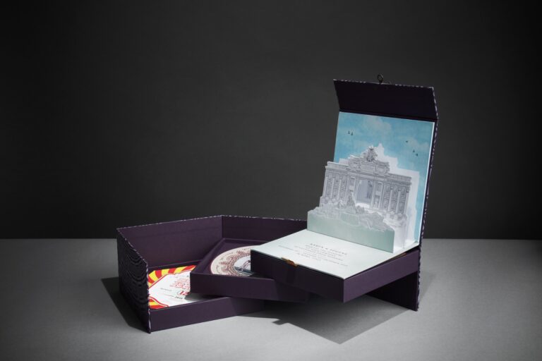Invitation suite opening on several levels inside its box, with the pop-up fountain at the back, Downey Luxury Stationery
