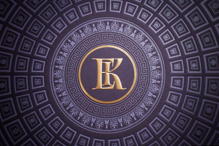 Gold foil and embossed couple's monogram at the centre of the box lid pattern, Downey Luxury Stationery
