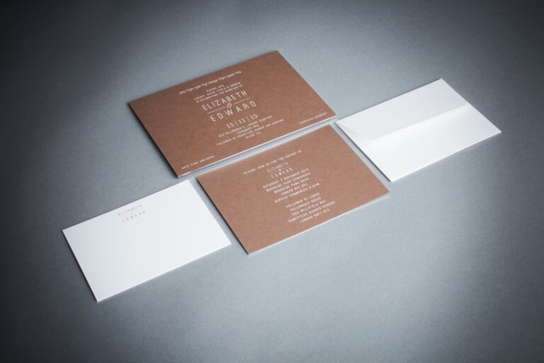 Engraved invitation, envelope and escort cards from the same suite, Downey Luxury Stationery