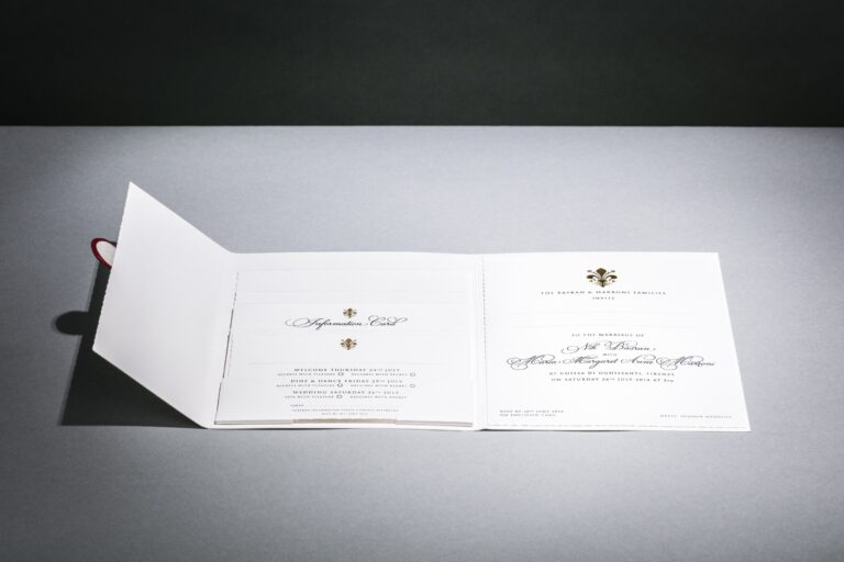 Three-fold invitation suite with inner pockets and gold die-stamped detail, Downey Luxury Stationery