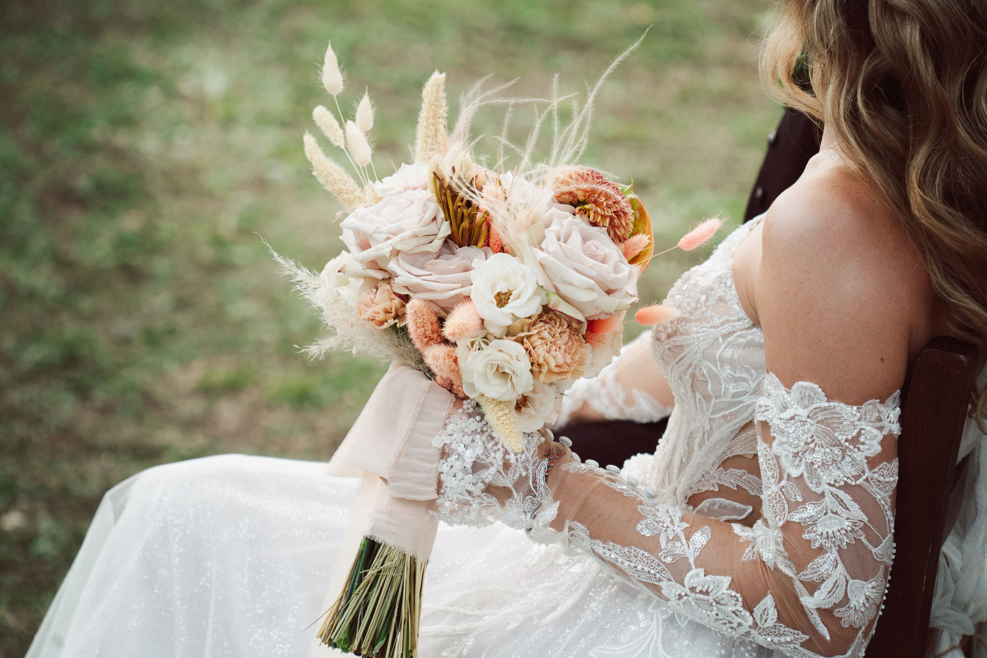 Bridal bouquet of blush roses and pampas grass held during a Tuscan ceremony, Dr Tiziana Di Molfetta