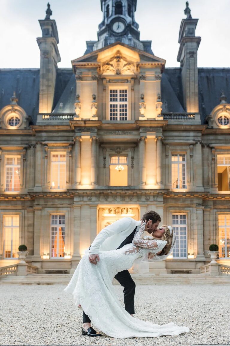 Floodlit chateau facade at night, Dream Paris Wedding