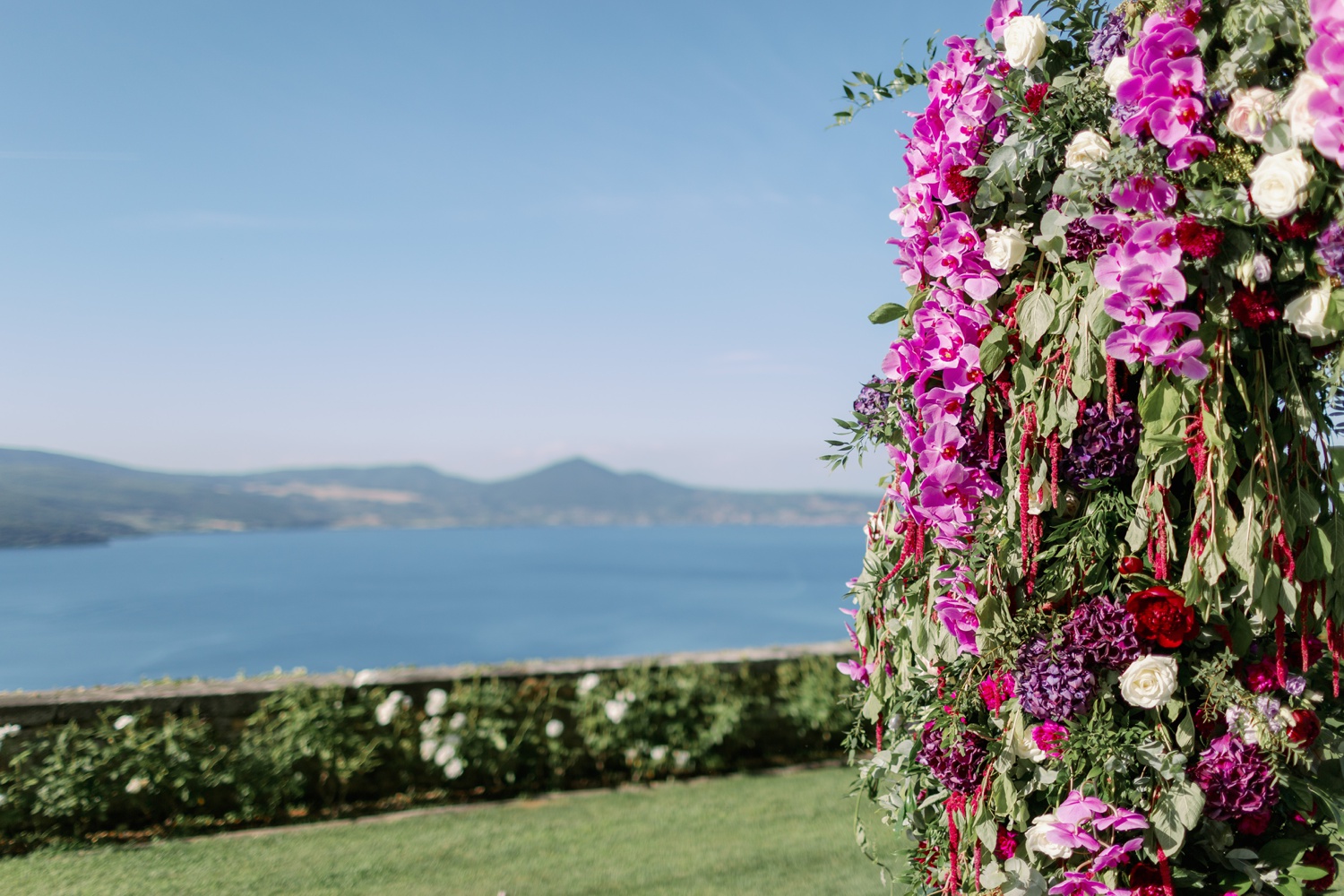 Ceremony flower arch above Lake Bracciano at the Orsini-Odescalchi Castle, Lazio, Dream Weddings By Francesca Resciniti