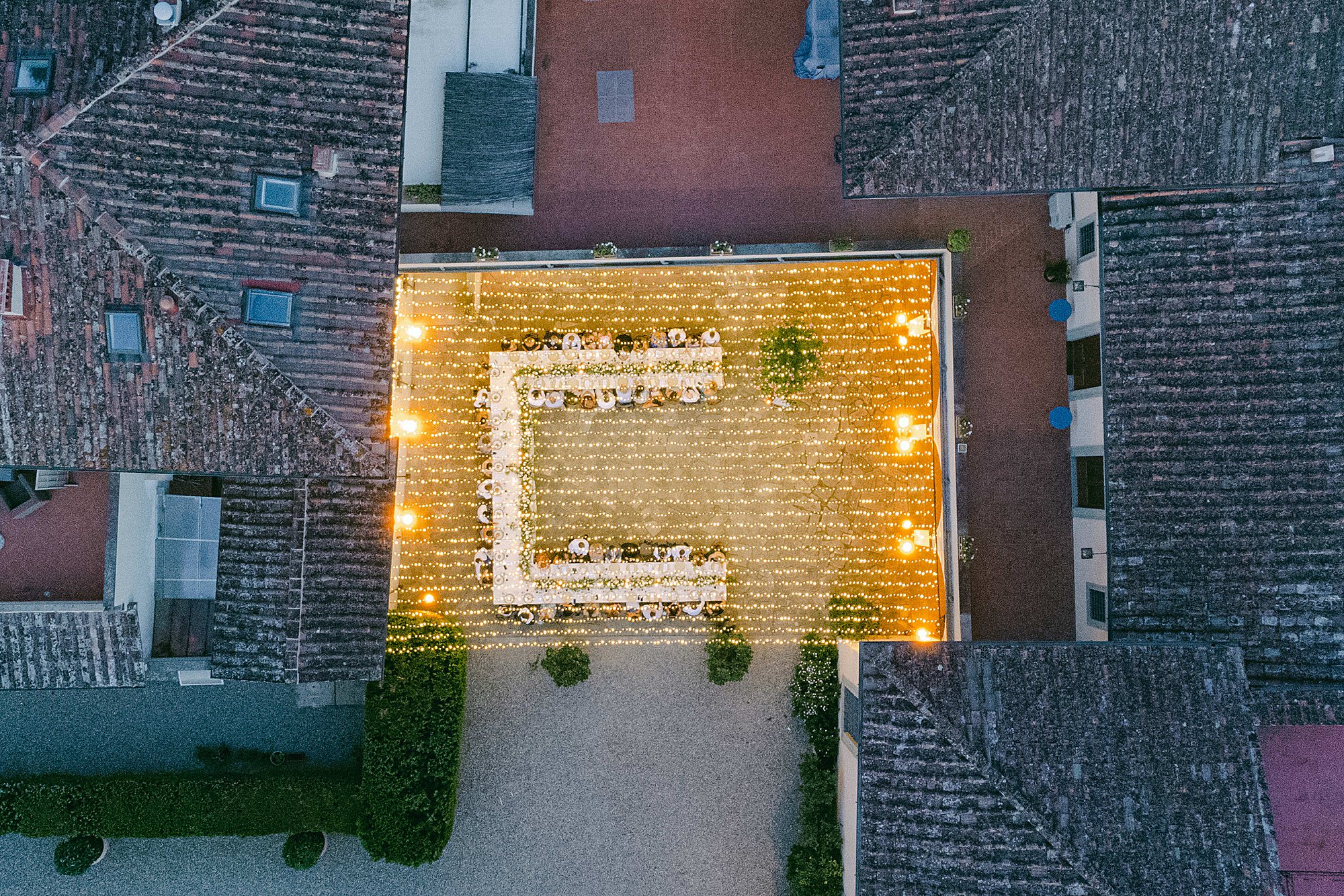 Aerial view of the candlelit dinner table in the courtyard at Villa Il Garofalo, Florence, Dream Weddings By Francesca Resciniti