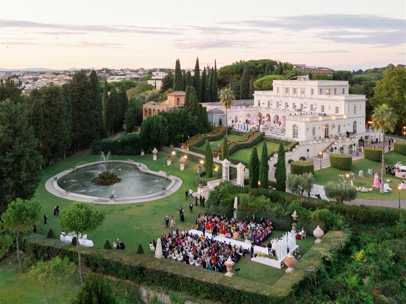 Aerial view of a garden ceremony in front of a white Roman villa, Dream Weddings Europe