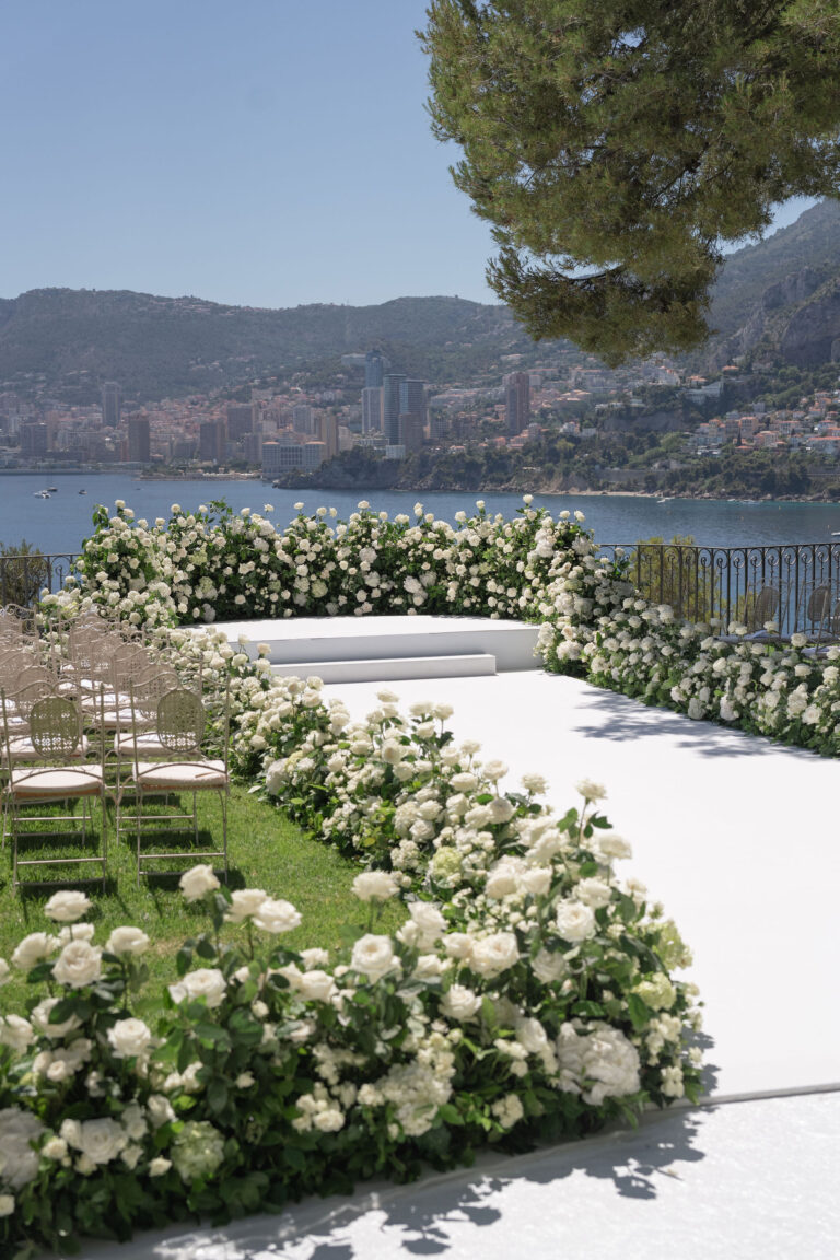 Flower-edged ceremony aisle overlooking the Riviera coast, Dream Weddings Europe