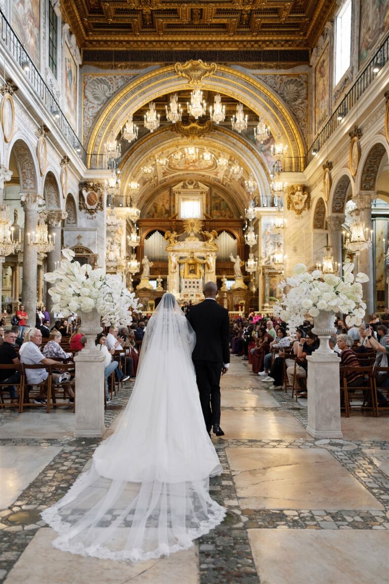 Bride walking up the aisle of a gilded Roman church, Dream Weddings Europe