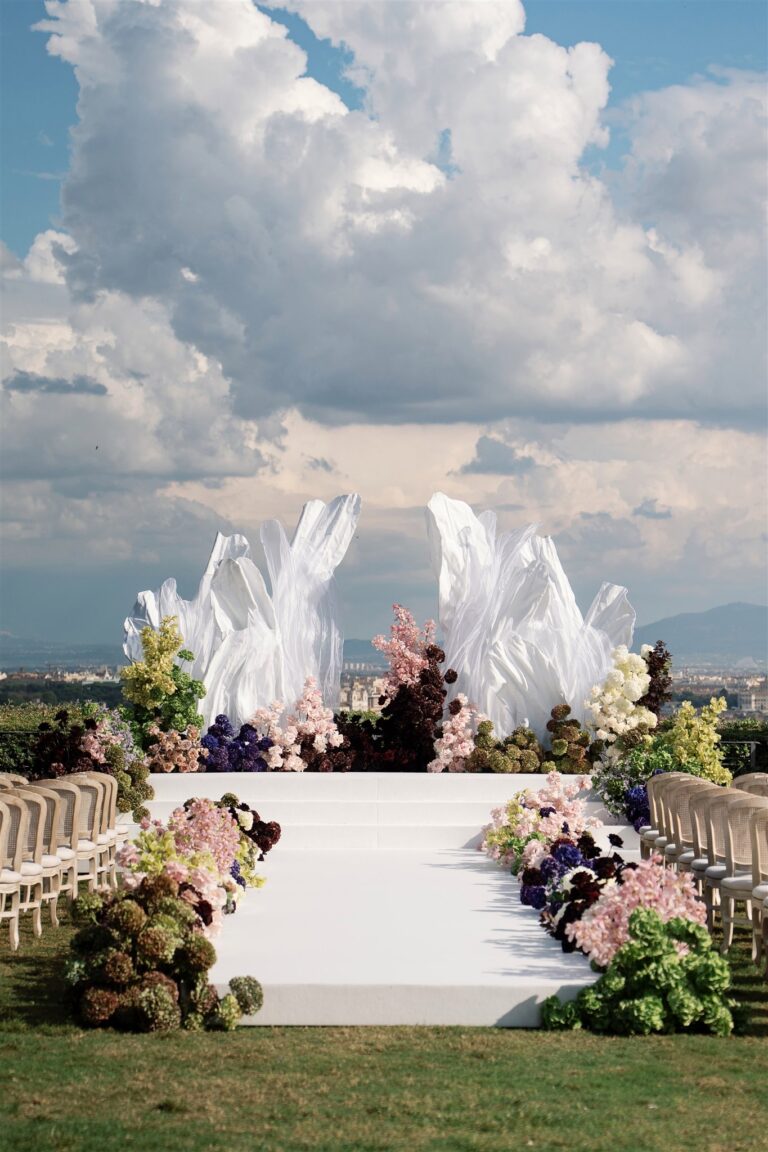 Sculptural white ceremony installation with a view over the bay, Dream Weddings Europe