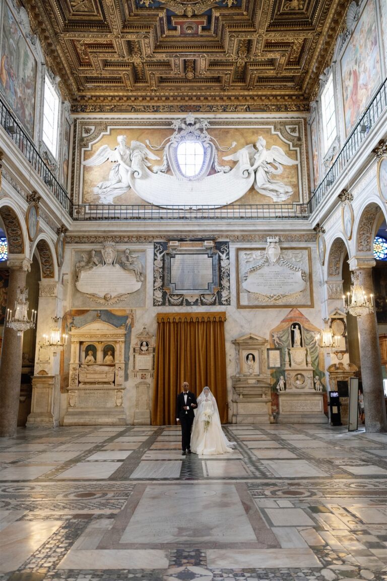 Couple at the centre of a frescoed Roman hall, Dream Weddings Europe